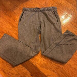 These are Nike Women's size medium gray straight leg sweatpants!
